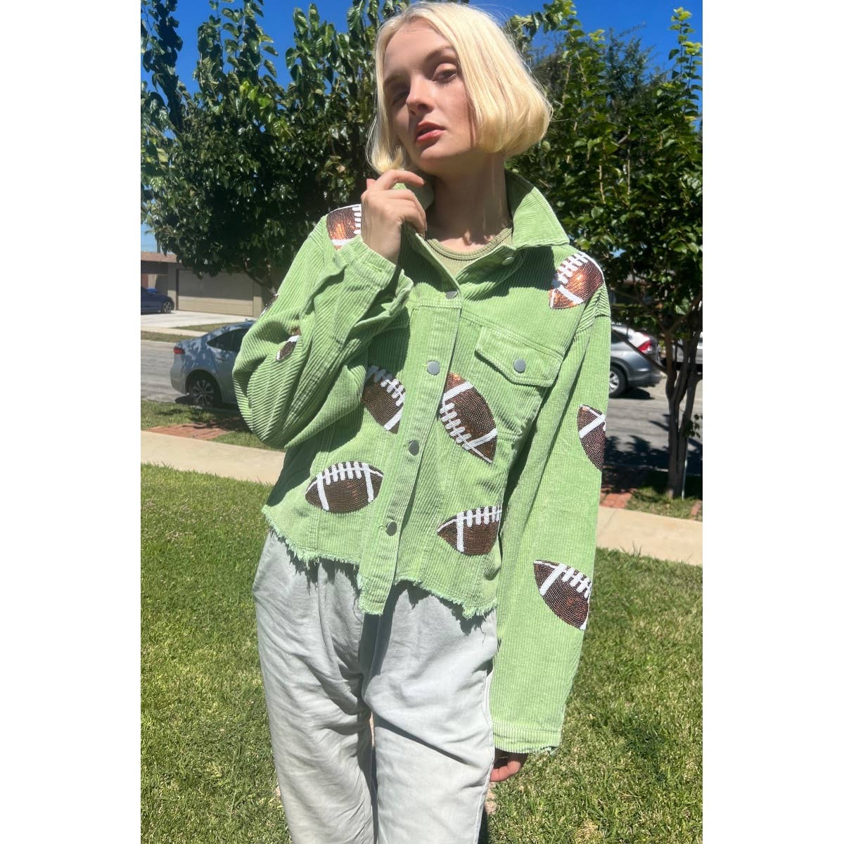 Football sequin corduroy jackets hanging on a rack