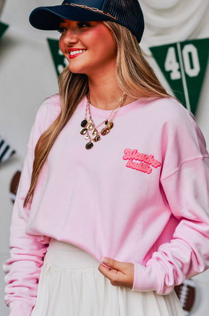 Bleacher Baddie light pink game day sweatshirt with bubble letter graphic