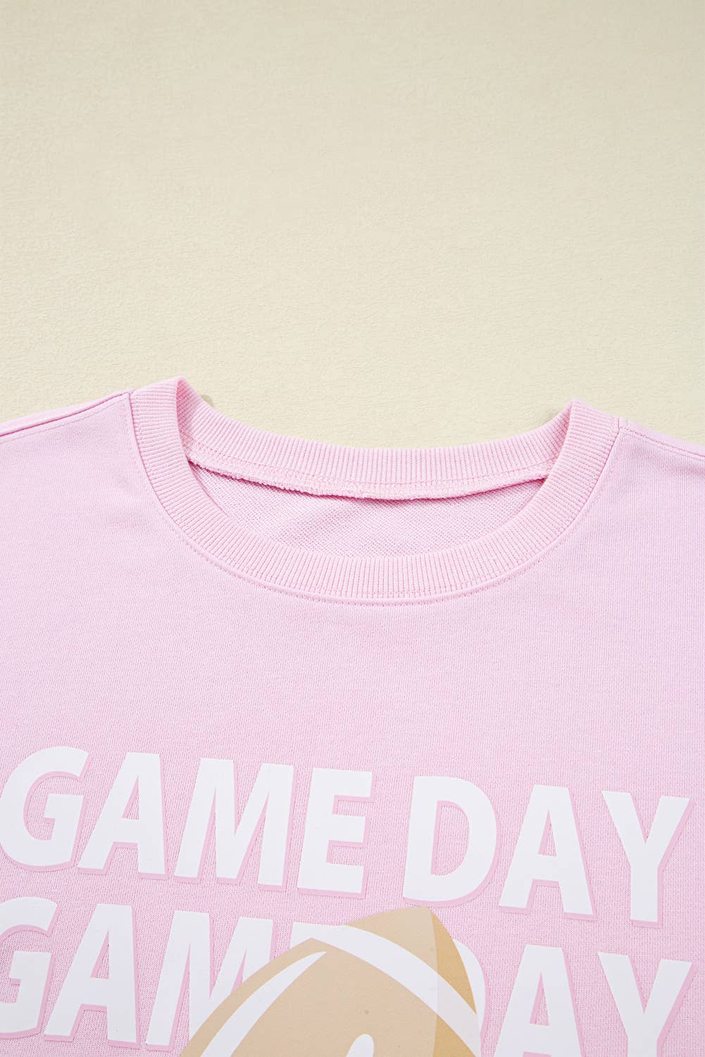 Game Day football sweatshirt close up of gold football print