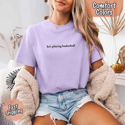 He’s Playing Basketball – Funny Sports Girlfriend Comfort Color Shirt for Women