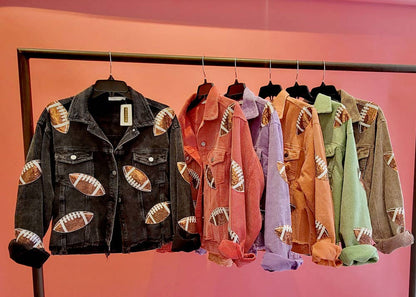 Green corduroy jacket with sequin football patches, cropped game day shacket styled with jeans