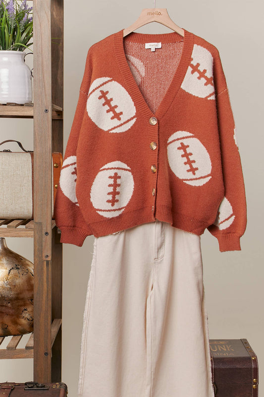 Football knit cardigan styled with matching ivory knit pants for game day