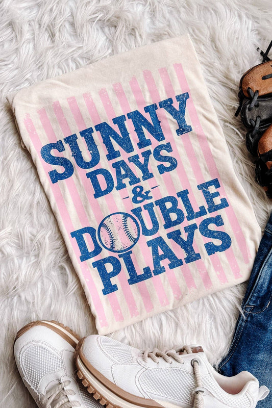 Sunny Days & Double Plays ivory baseball graphic tee flat lay with sneakers and denim