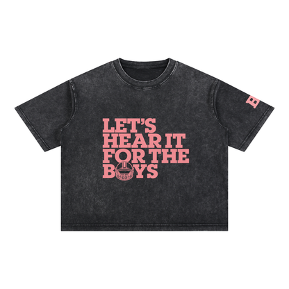 Black mineral wash tee with pink Let's Hear It for the Boys football helmet graphic, front view