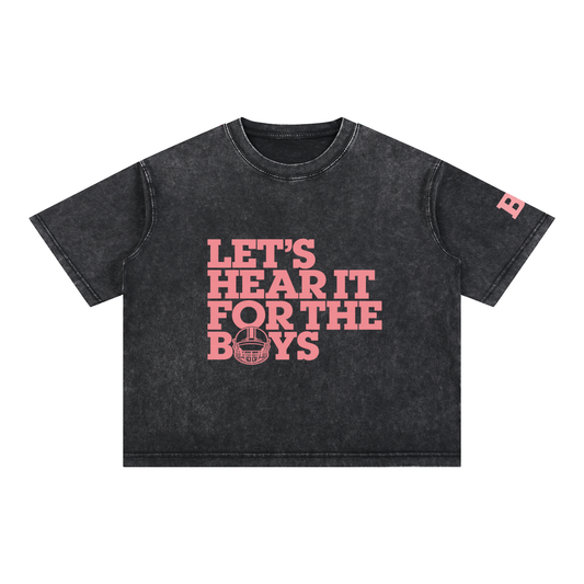 Black mineral wash tee with pink Let's Hear It for the Boys football helmet graphic, front view
