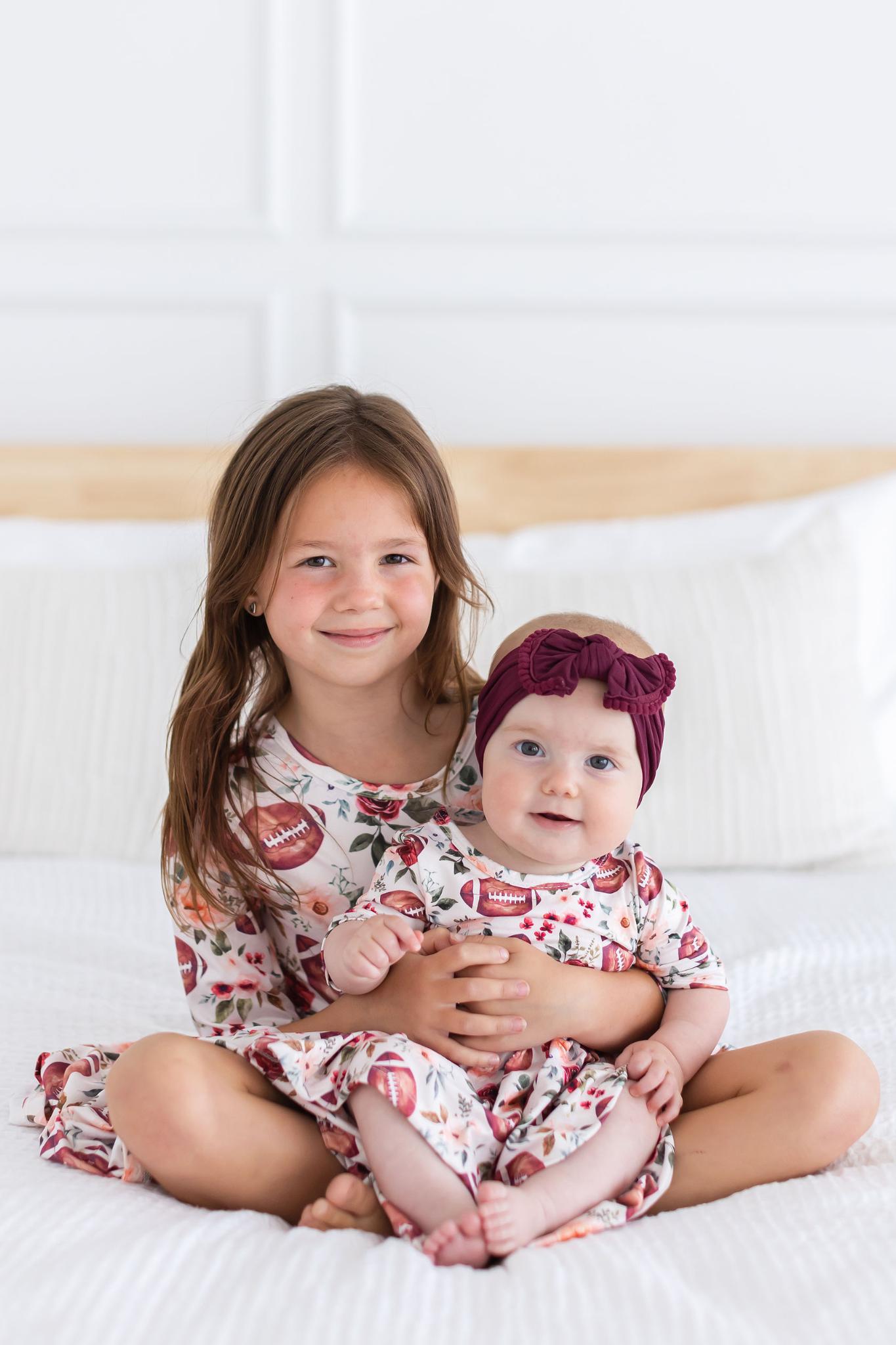 Footballs and Flowers -- Girls 3/4 Sleeve Twirl Dress