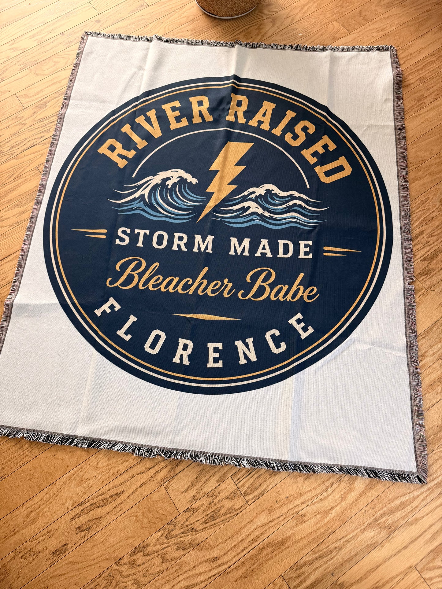 Fringed woven tapestry blanket from Bleacher Babe — perfect for couch, dorm, or bleacher seating
