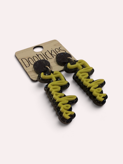 Angled view of gold and navy glitter Flashes script earrings for Florence game day