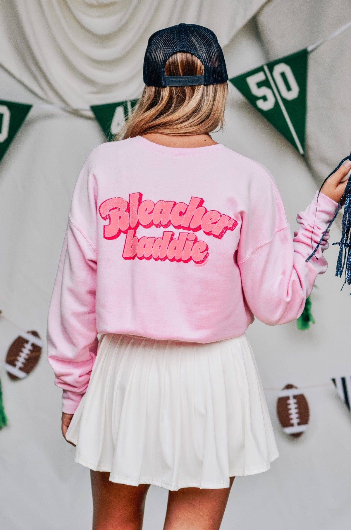 Bleacher Baddie sweatshirt styled for game day in the stands