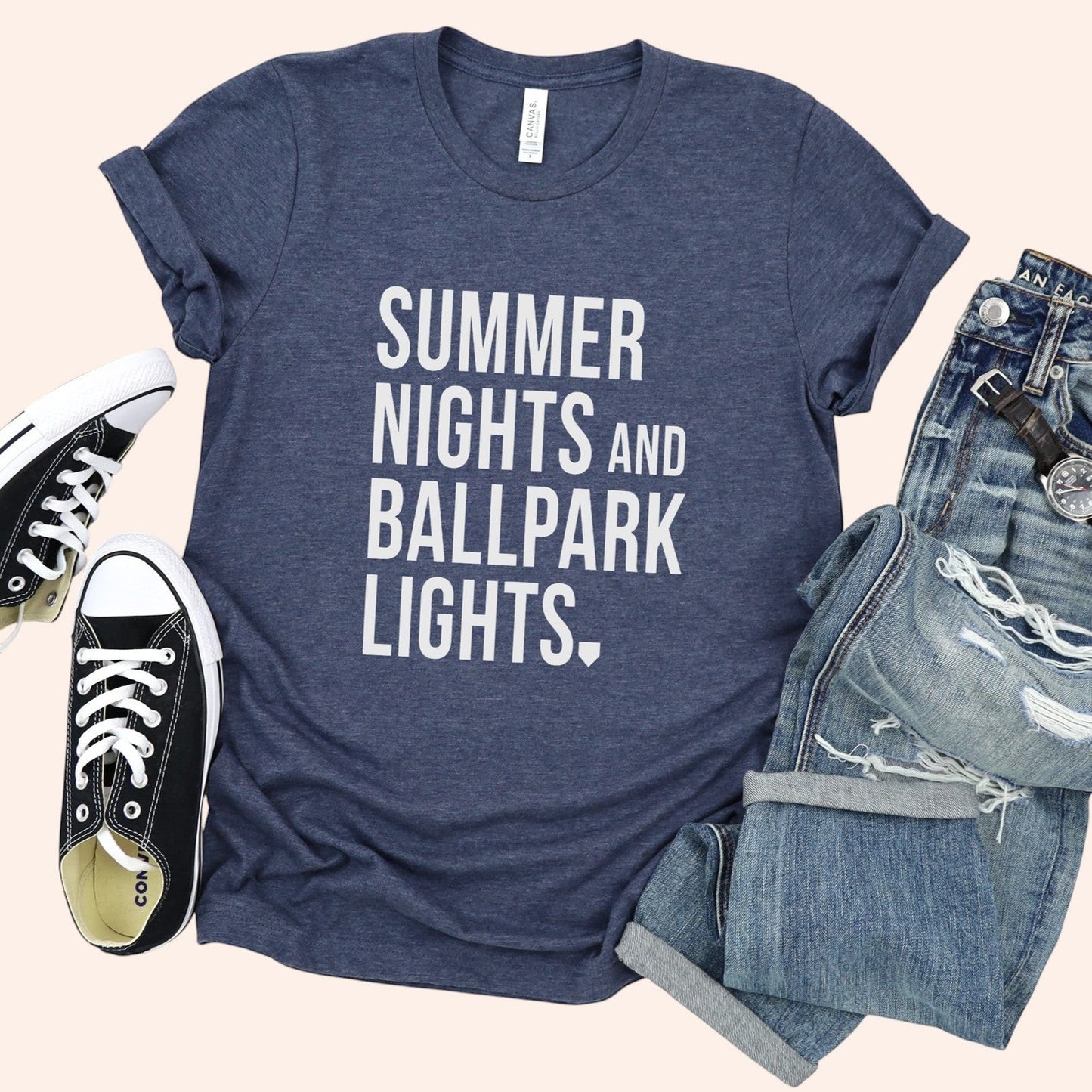Bleacher Babe navy blue graphic tee with white text "SUMMER NIGHTS AND BALLPARK LIGHTS."