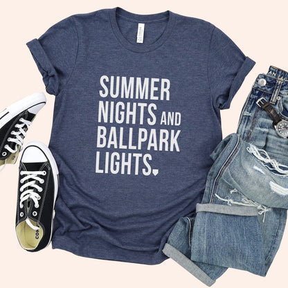 Bleacher Babe navy blue graphic tee with white text "SUMMER NIGHTS AND BALLPARK LIGHTS."