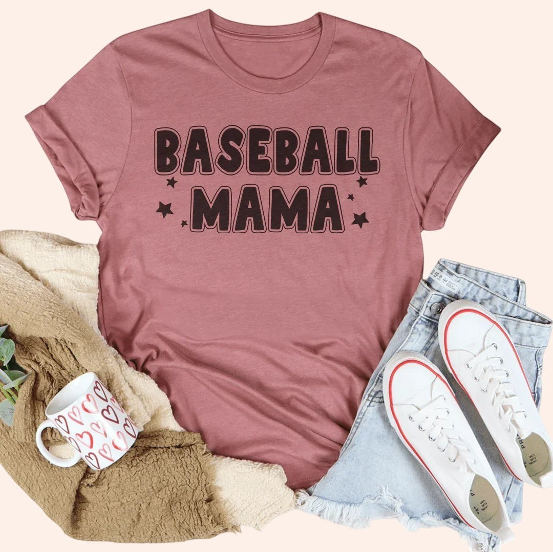 Bleacher Babe dusty rose graphic tee with "Baseball Mama" text and stars. Soft cotton, casual fit.