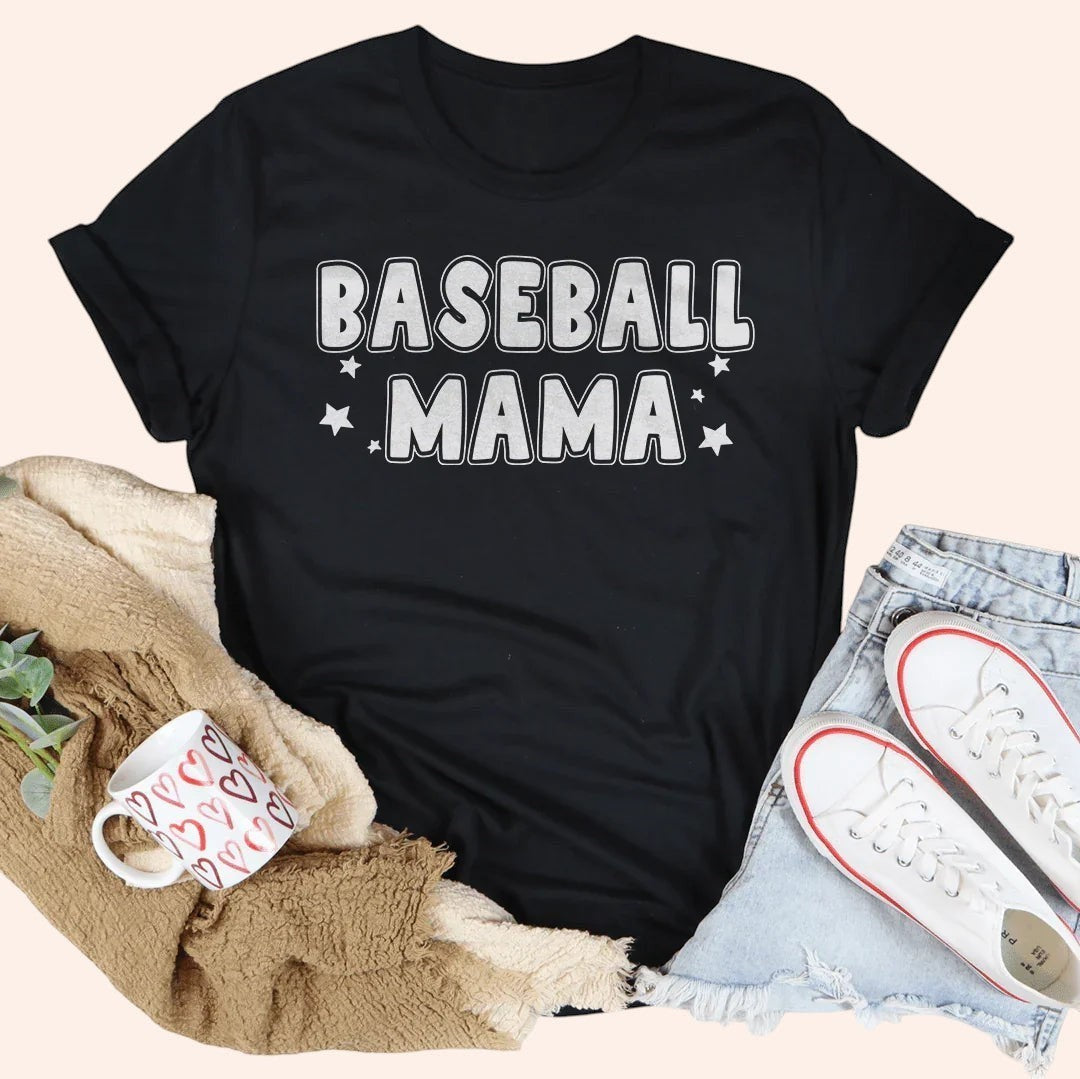 Bleacher Babe black graphic tee with "BASEBALL MAMA" in white bubble letters and stars.
