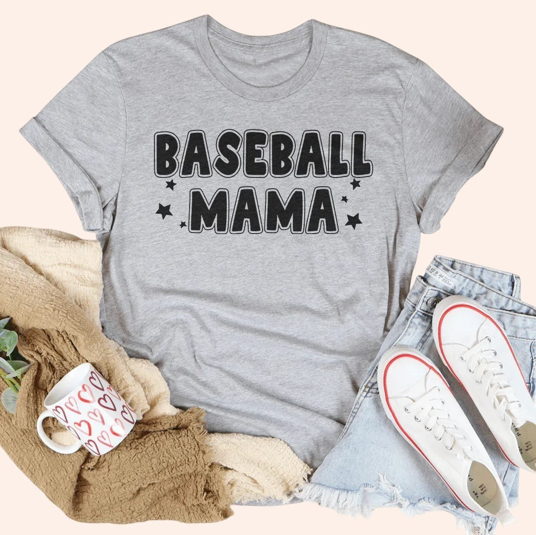 Bleacher Babe grey graphic tee with "BASEBALL MAMA" text and stars. Soft cotton, everyday fit.