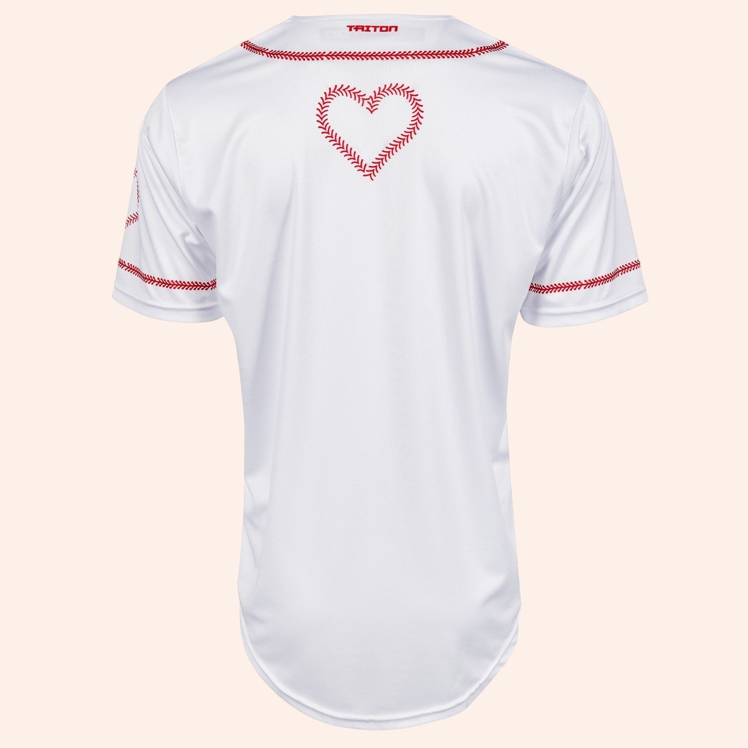 Bleacher Babe white baseball jersey with red stitching detail and a baseball-stitched heart on the back.