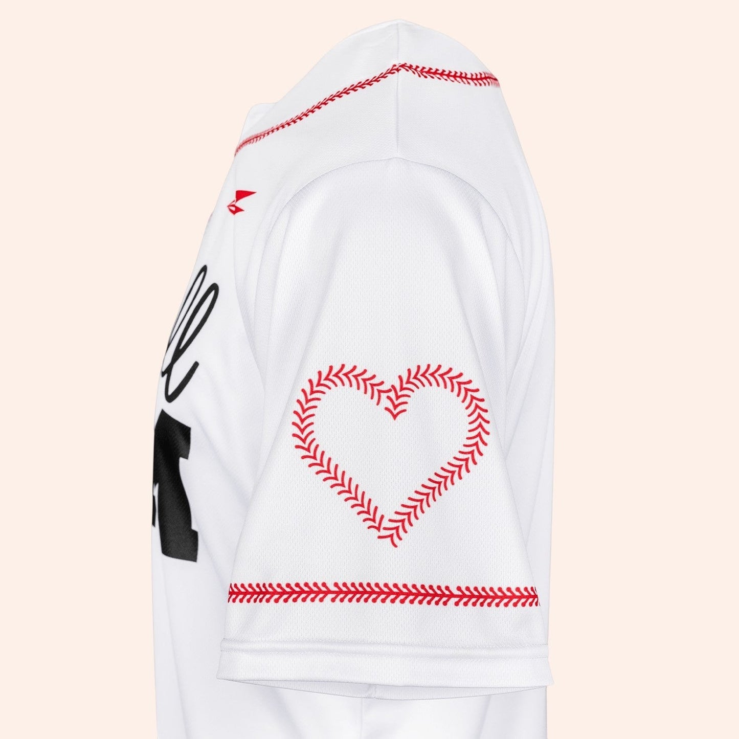 Bleacher Babe white baseball jersey with red stitching detail and a baseball heart graphic on the sleeve.