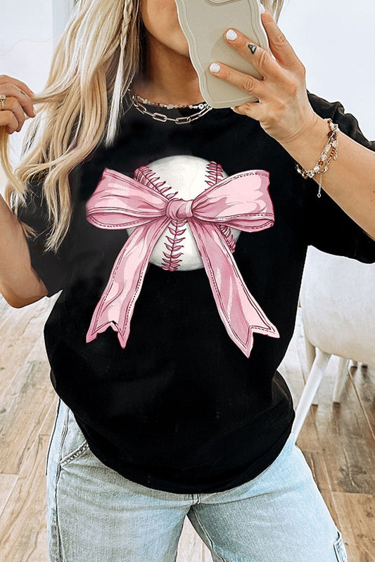 Bleacher Babe black baseball tee with a graphic of a baseball wrapped in a pink bow.