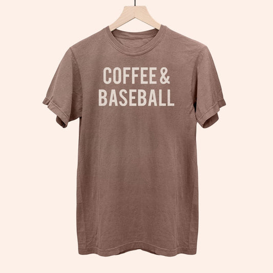 Bleacher Babe brown cotton t-shirt with "COFFEE & BASEBALL" graphic print in white.