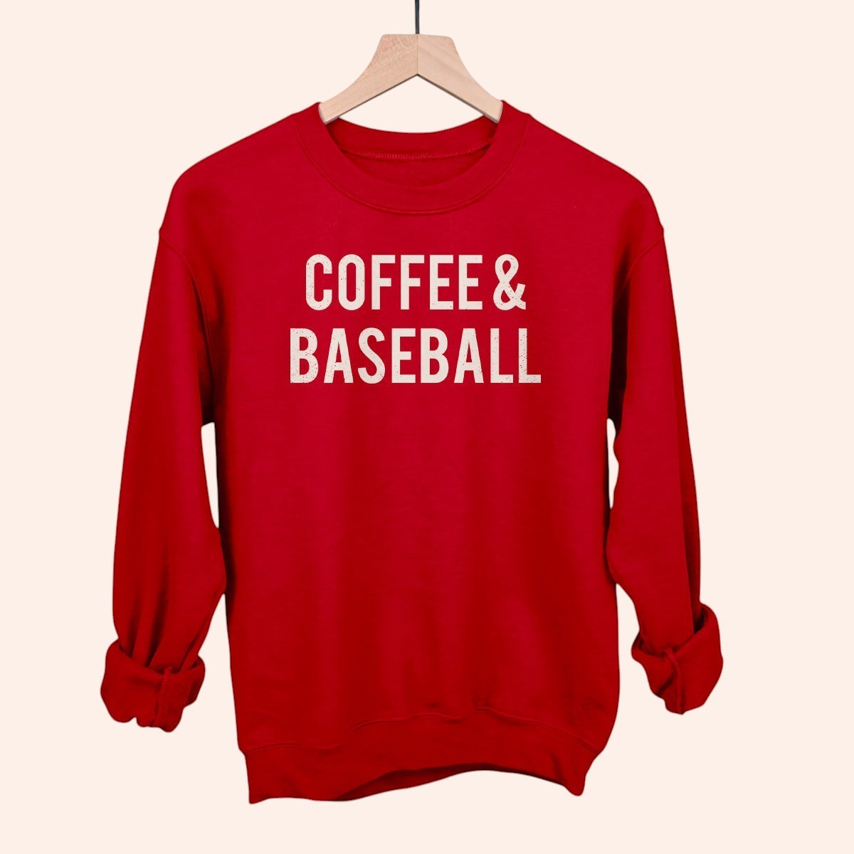 Bleacher Babe red crewneck sweatshirt with white distressed "COFFEE & BASEBALL" graphic. Casual, comfortable.