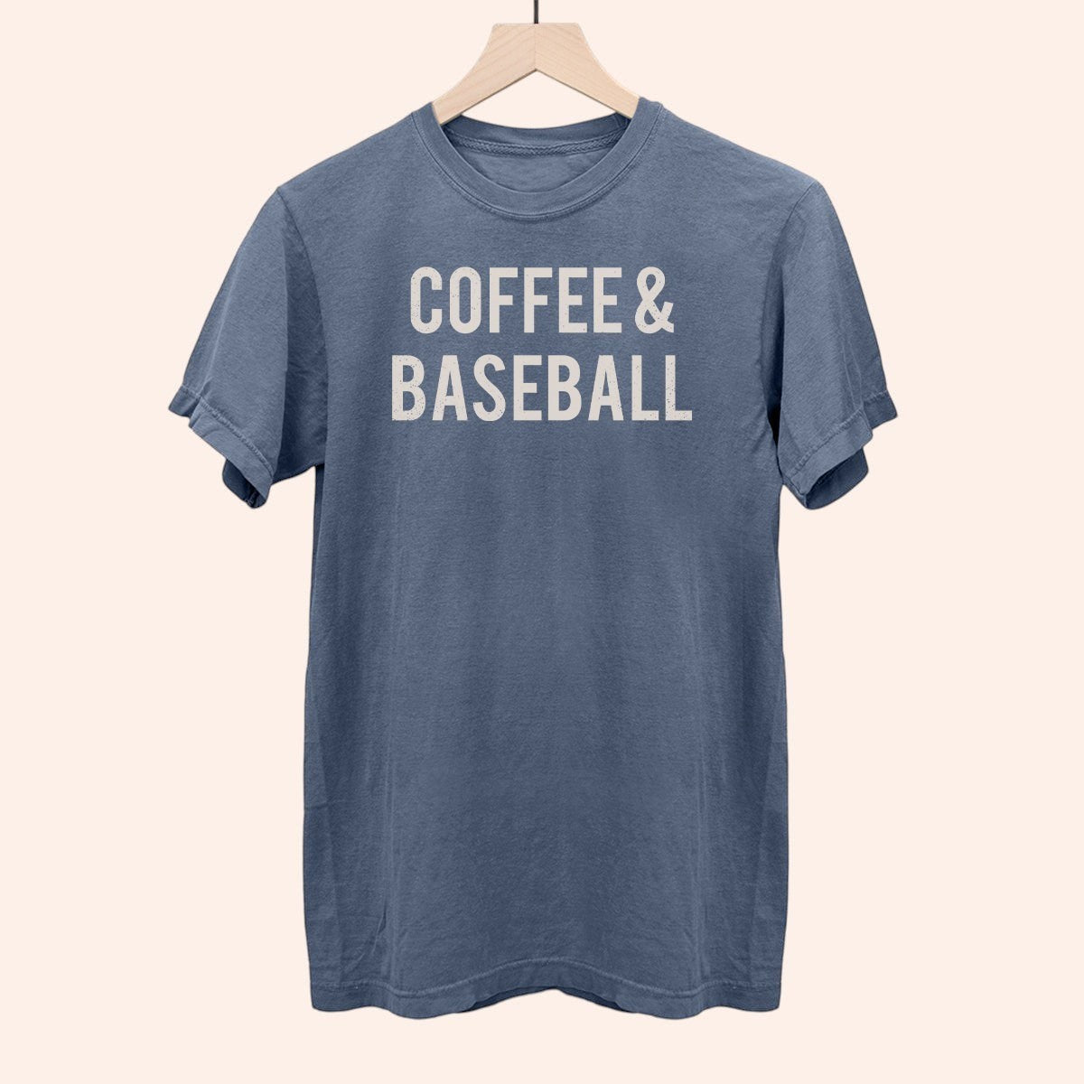 Bleacher Babe blue cotton t-shirt with "COFFEE & BASEBALL" graphic print. Casual unisex tee.