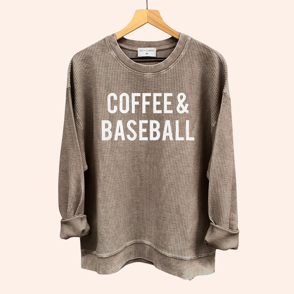 Bleacher Babe brown waffle knit crewneck sweatshirt with "COFFEE & BASEBALL" graphic print. Relaxed fit.