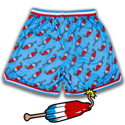 Bleacher Babe light blue mesh baseball shorts with a repeating pattern of red, white, and blue popsicles with fuses.
