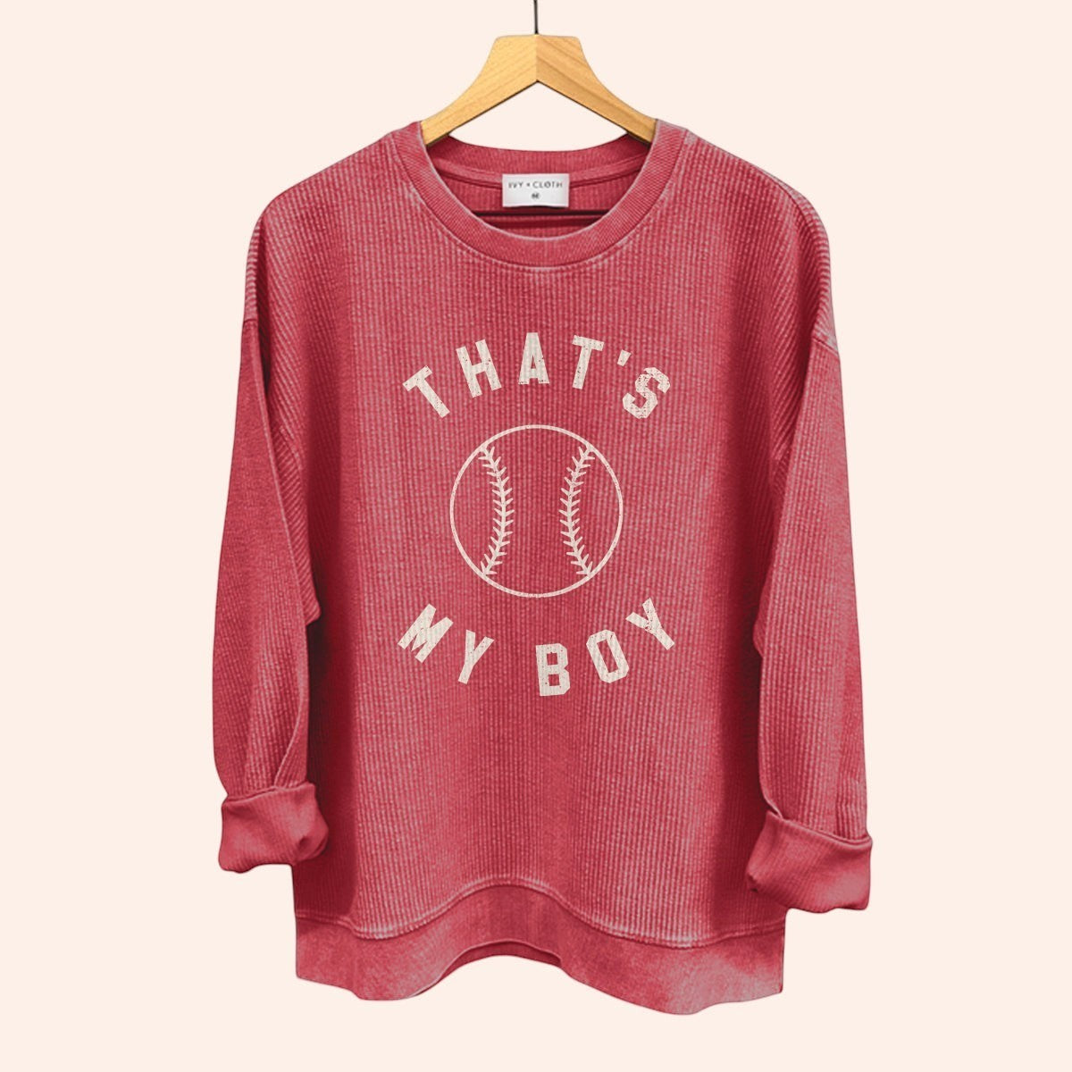 Bleacher Babe red corduroy crewneck sweatshirt with "That's My Boy" and baseball graphic.