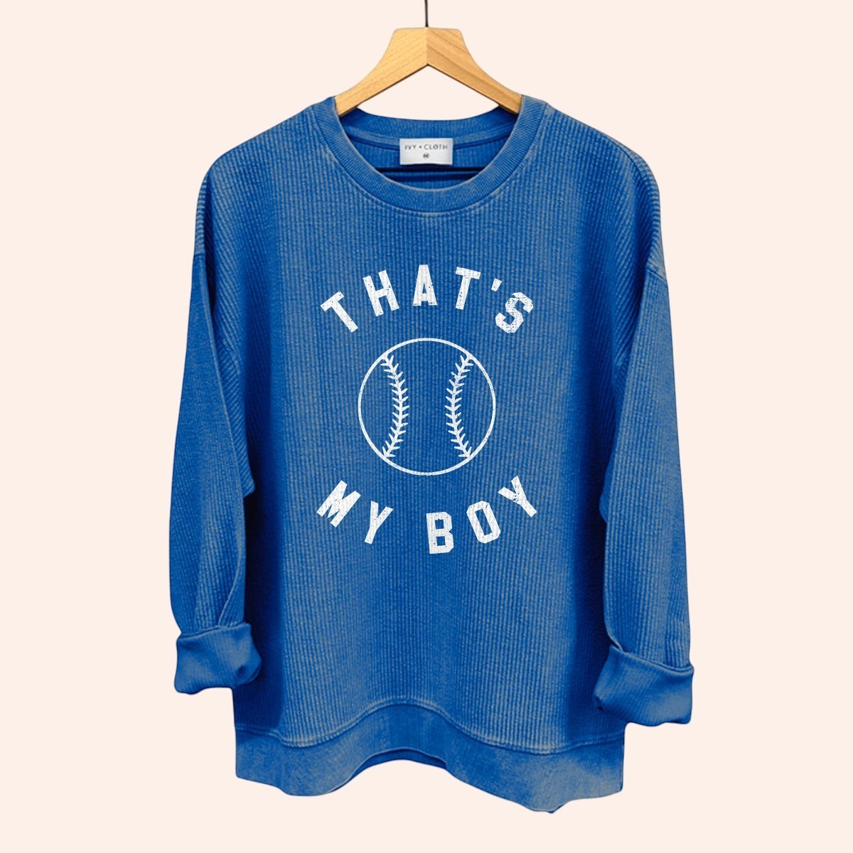 Bleacher Babe blue waffle knit crewneck sweatshirt with "That's My Boy" and baseball graphic.
