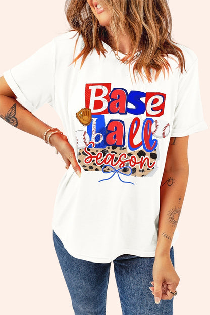 Bleacher Babe white t-shirt with "Baseball Season" graphic featuring baseballs, a glove, and leopard print.