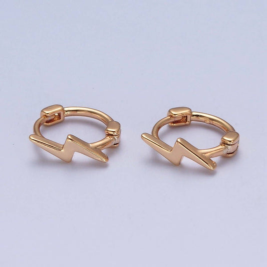 Gold lightning bolt huggie hoop earrings by Aim Eternal – dainty pair on light background